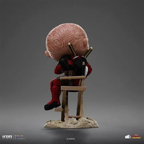 Close-up of Deadpool’s unmasked face on MiniCo vinyl figure – Marvel collectible